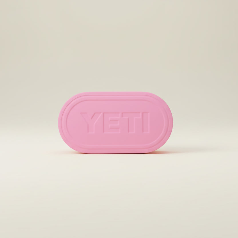 Pink bag with 'YETI' branding on a white background