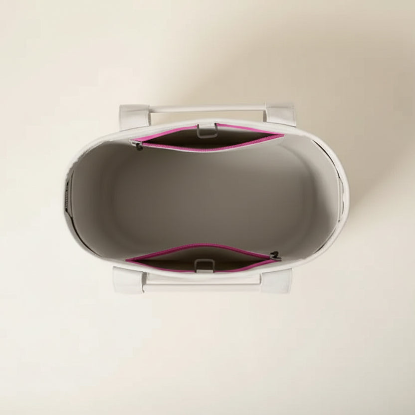 Gray and pink electronic device on a white background