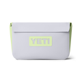 Light purple cooler bag with green accents and YETI logo on a white background
