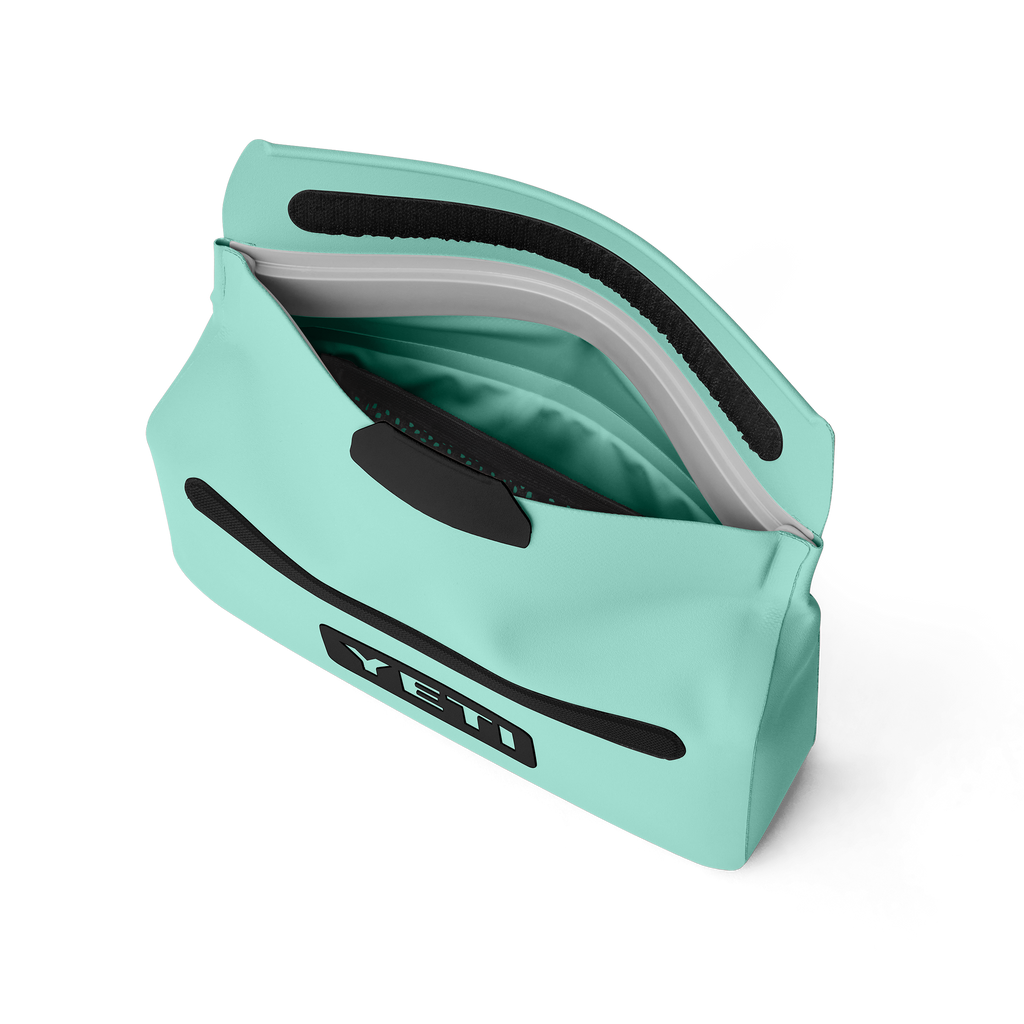 Teal Yeti cooler bag on a white background