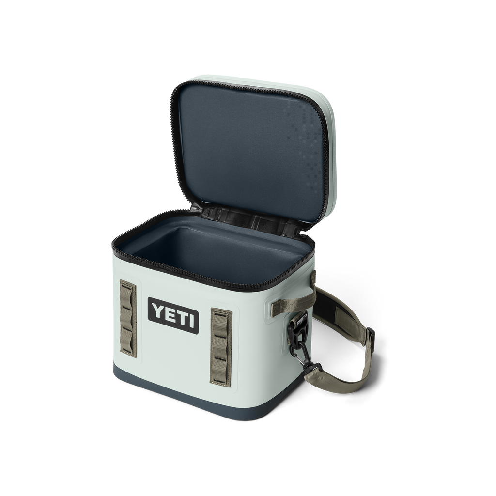 YETI cooler box with open lid on a white background
