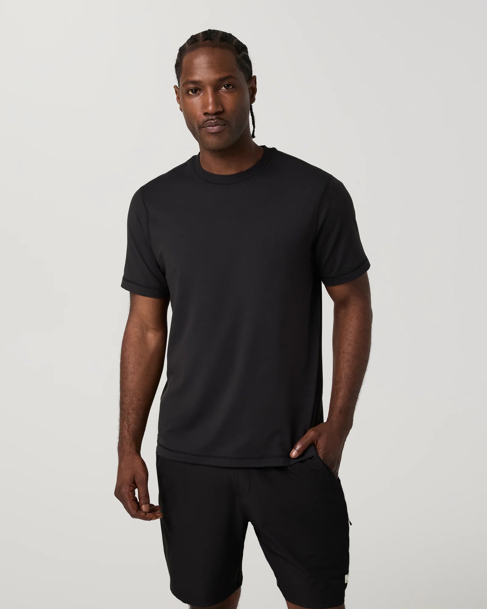 man with a black t-shirt in a studio