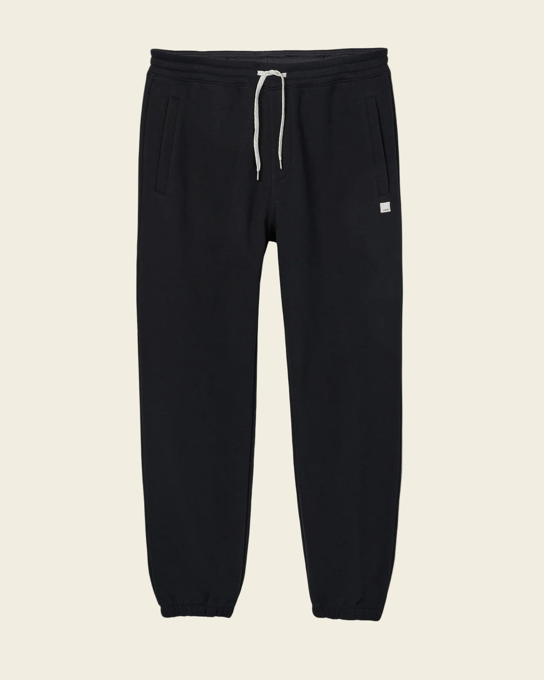 Black sweatpants with a small white logo on a white background