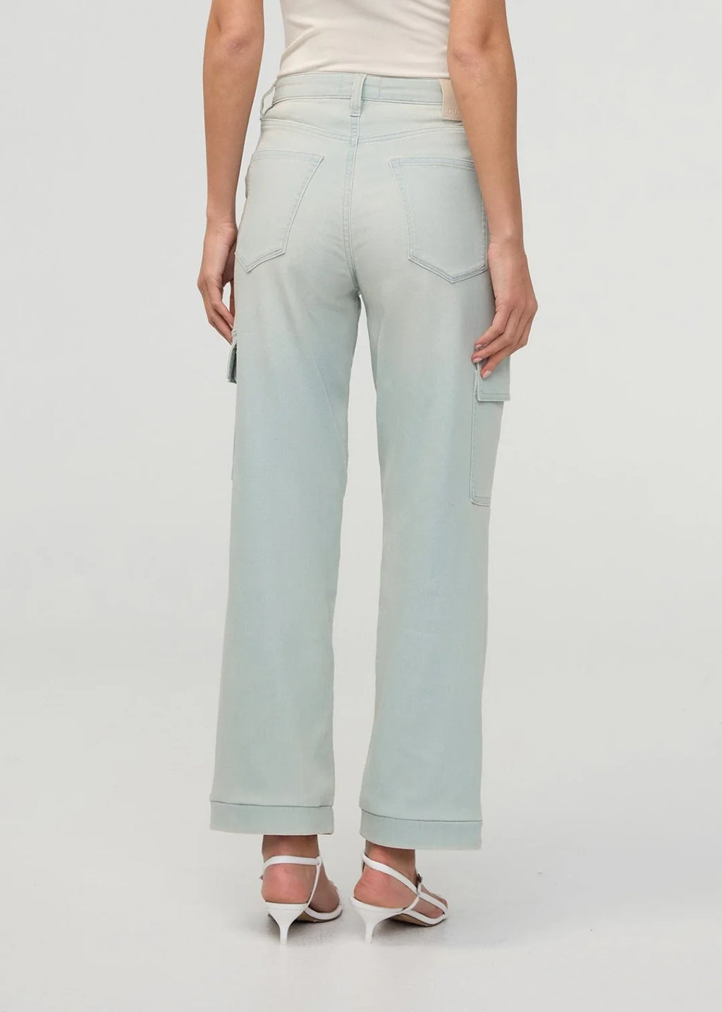 Light blue wide-leg pants worn by a person on a white background