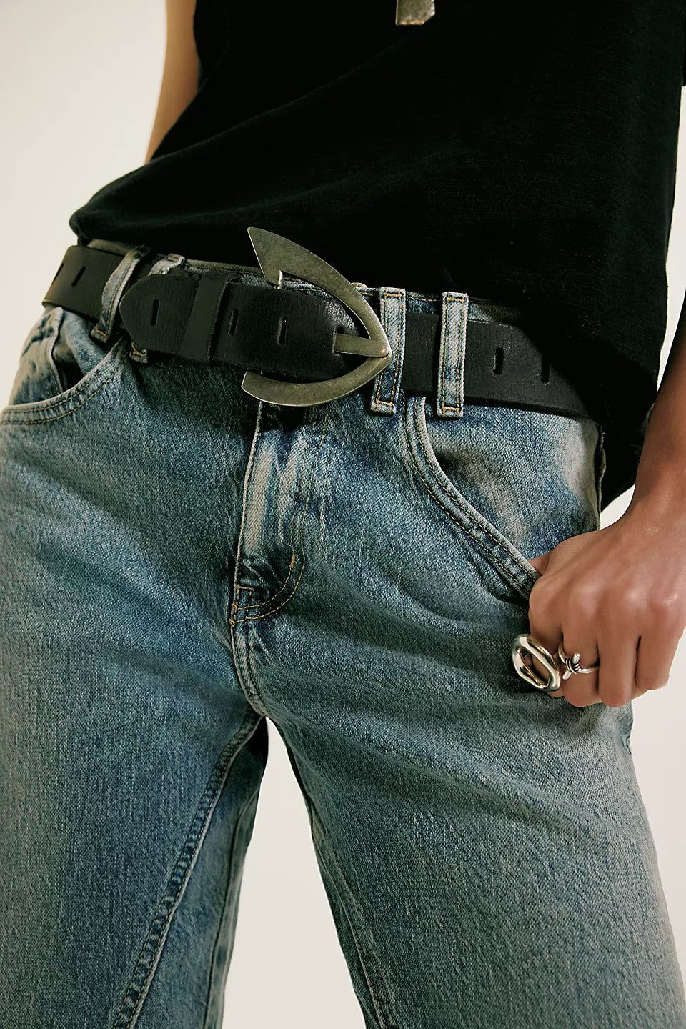 We The Free Noa Belt in black on a model wearing jeans