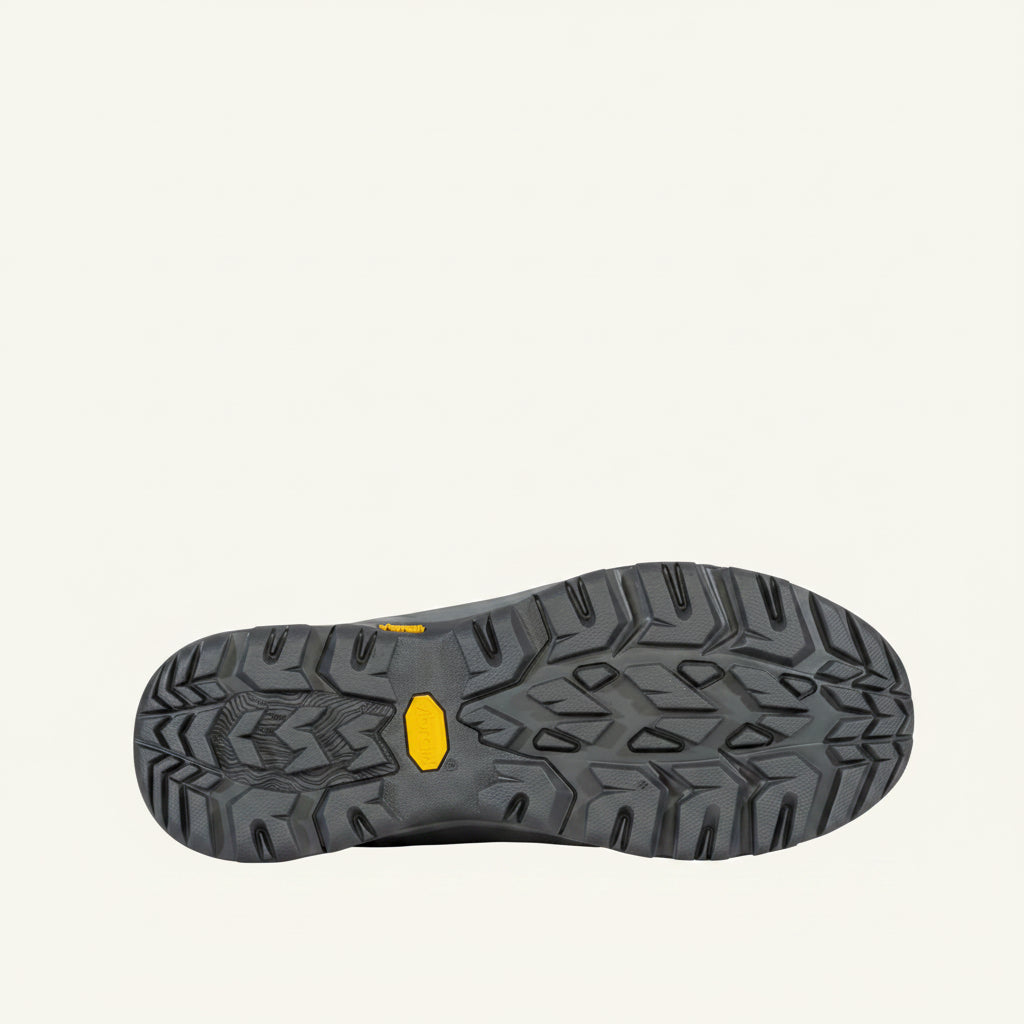 Close-up of a shoe sole with a textured pattern on a white background