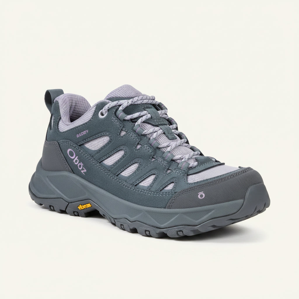 Gray hiking shoe with brand logo on a white background