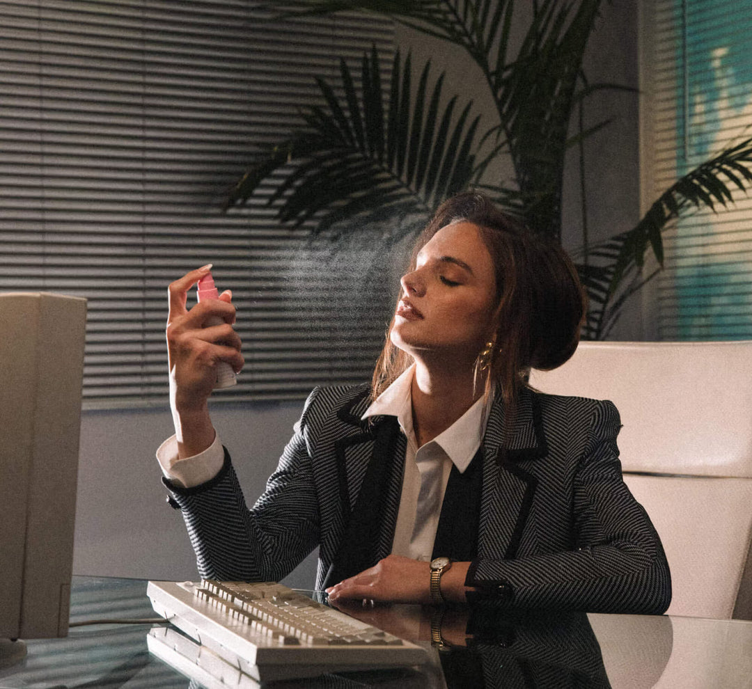 Woman in a professional setting using a smartphone