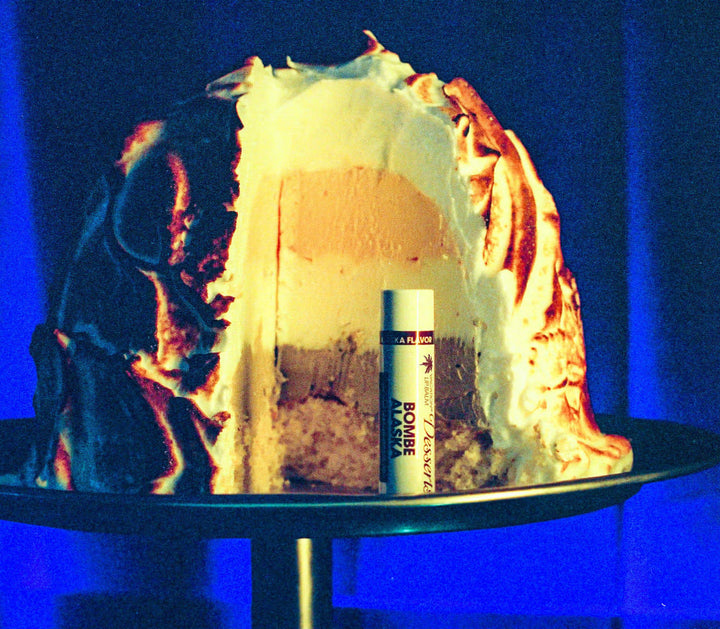 Burning candle with a blue background