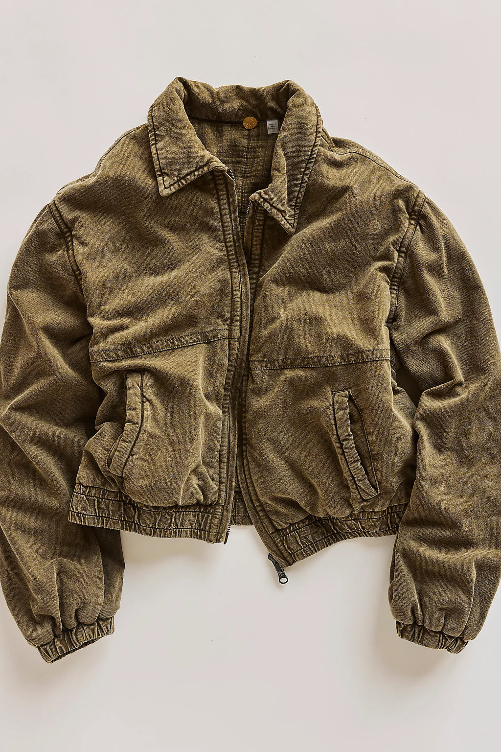 A green jacket on a white background