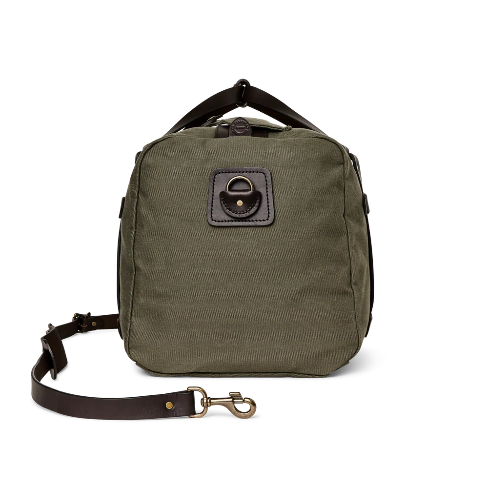 An olive green canvas shoulder bag with dark brown leather trim and a matching detachable shoulder strap, shown on a plain white background.