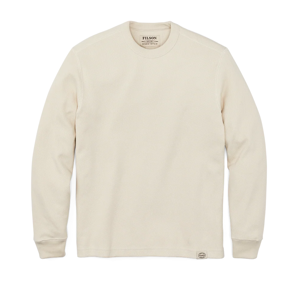 An off-white long-sleeve crewneck sweatshirt by Filson, displayed flat against a solid white background.