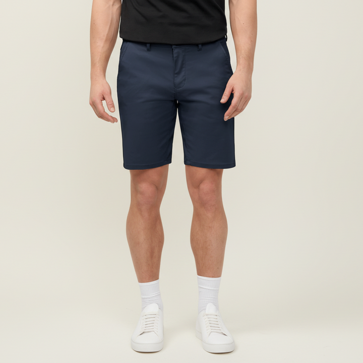 Person wearing navy shorts on a transparent background