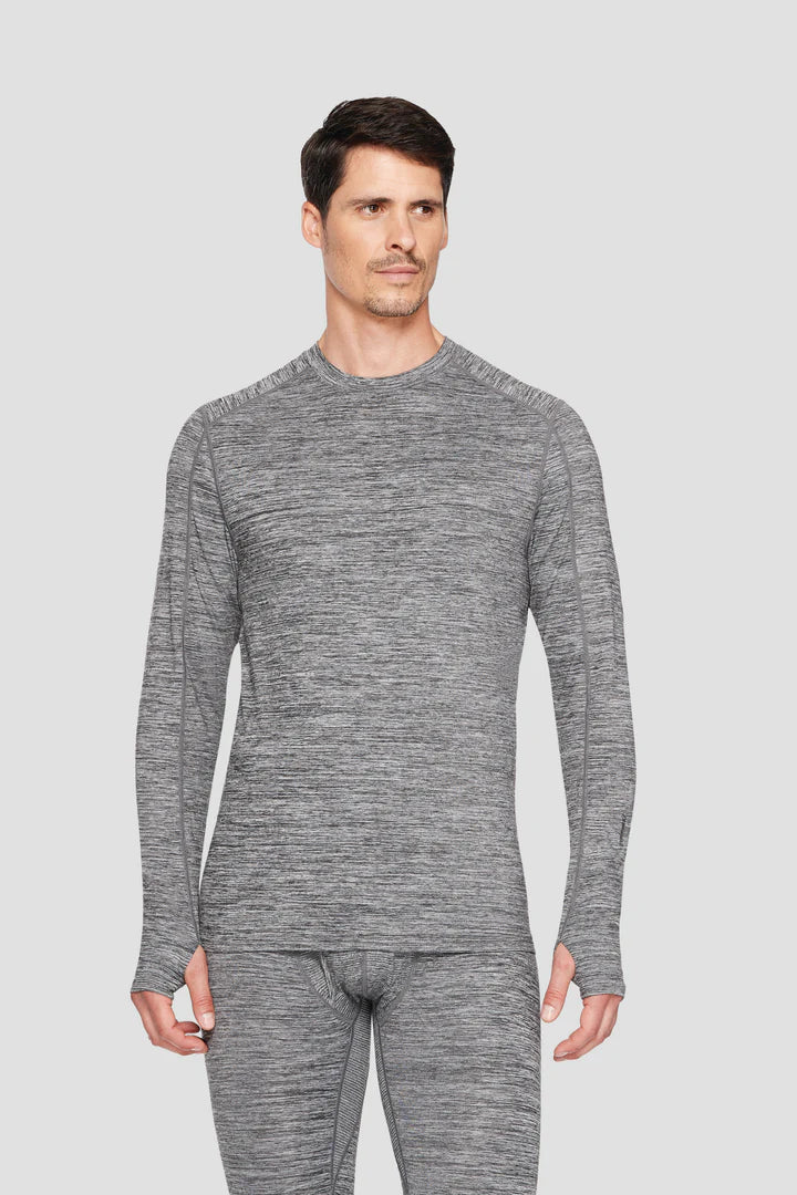 Man wearing a gray long-sleeve thermal shirt and pants on a light gray background