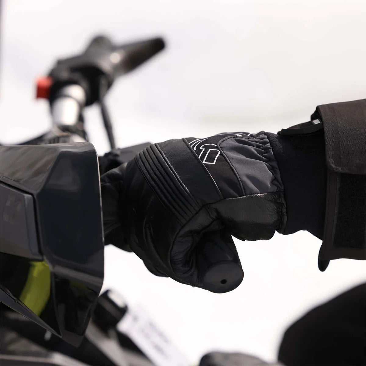 Black glove with text on a white background