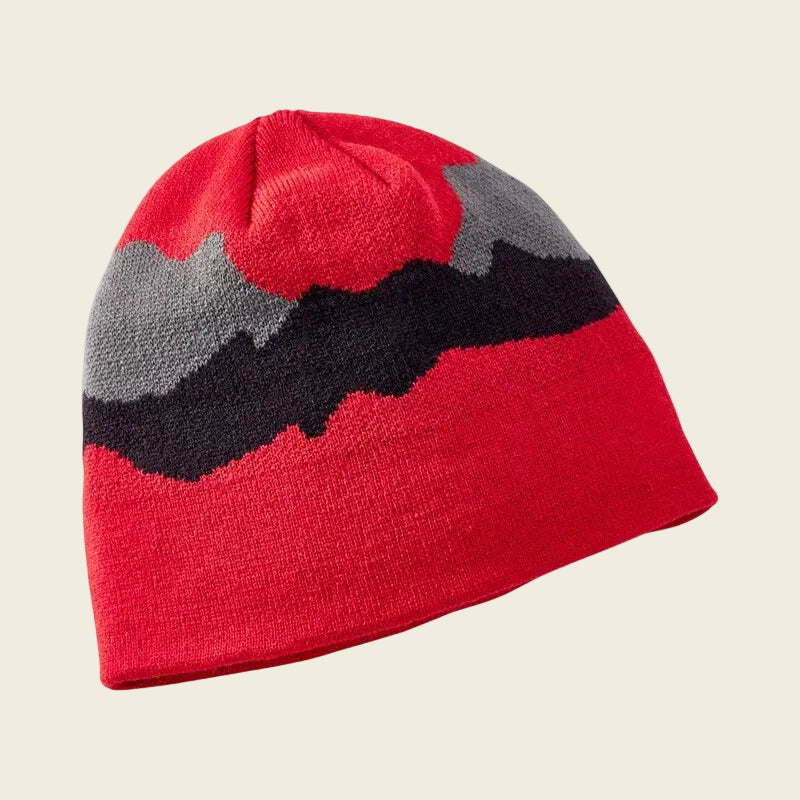 Red knit beanie with gray and black stripes on a white background