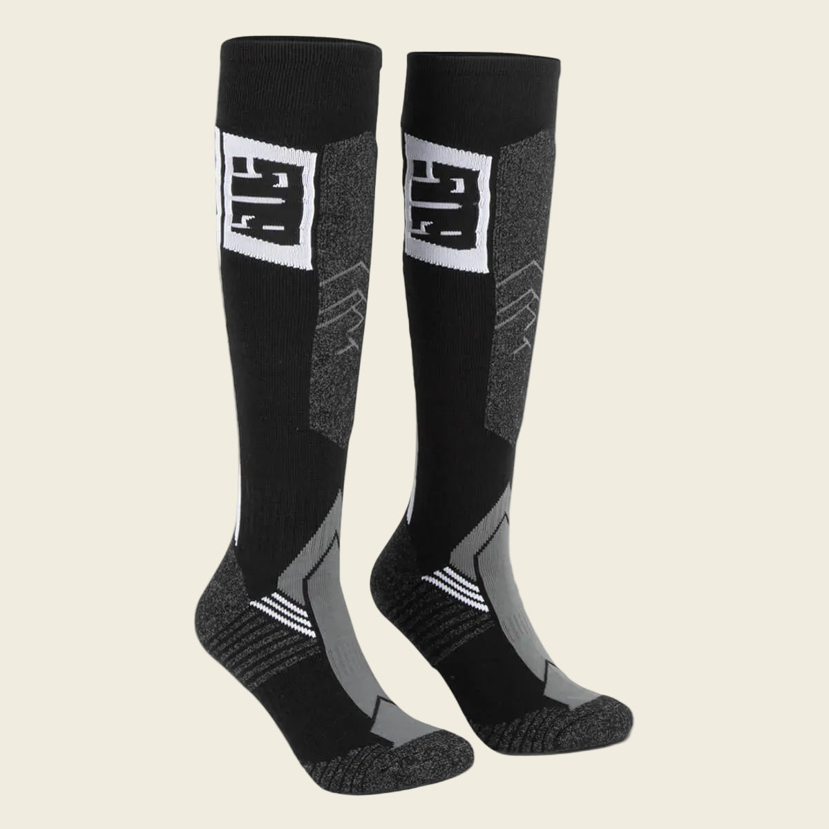 Black and gray socks with a logo on a white background