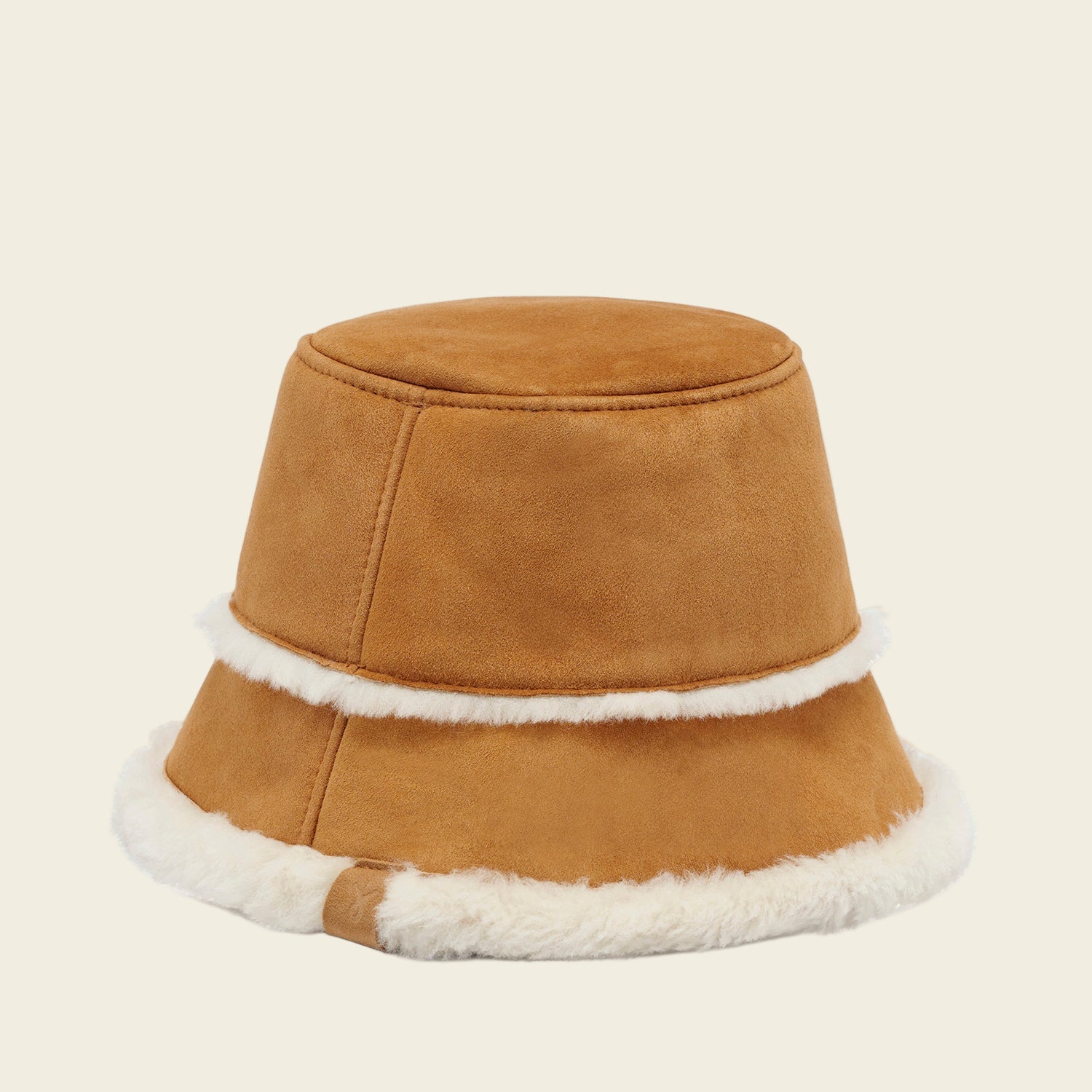 Brown bucket hat with white fur trim on a white background