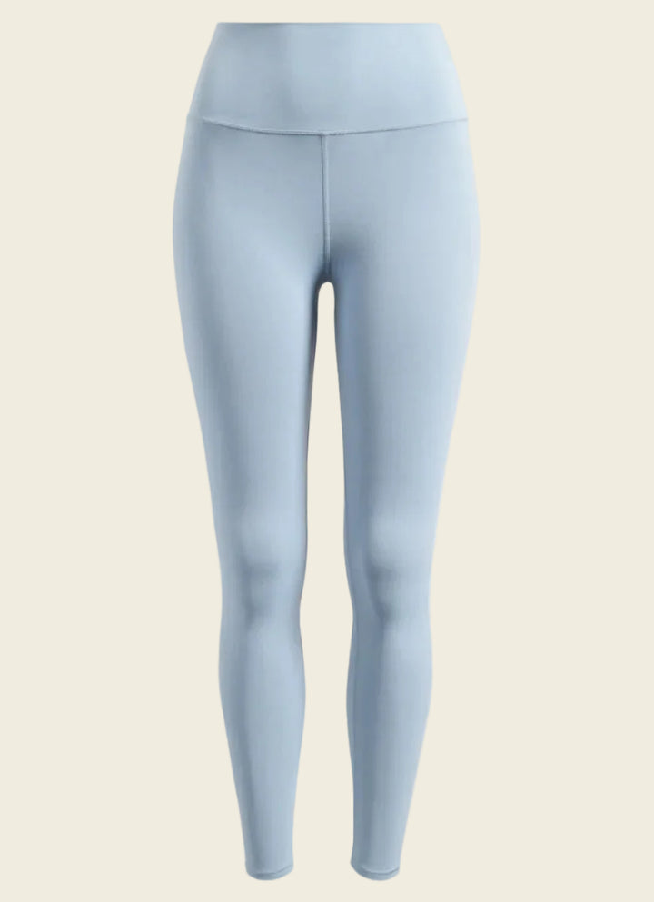 Light blue leggings on a white background