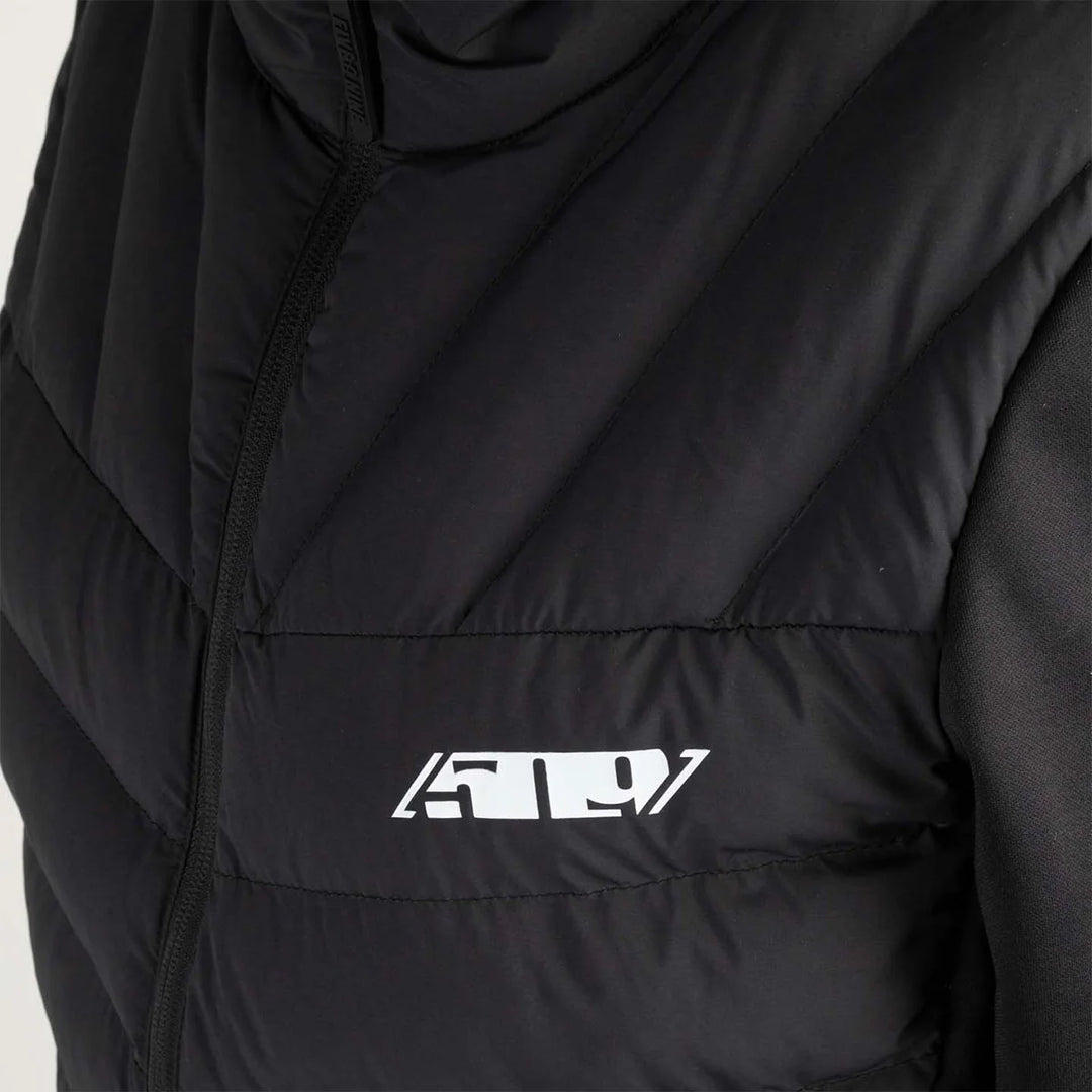 Black jacket with a brand logo on a light gray background