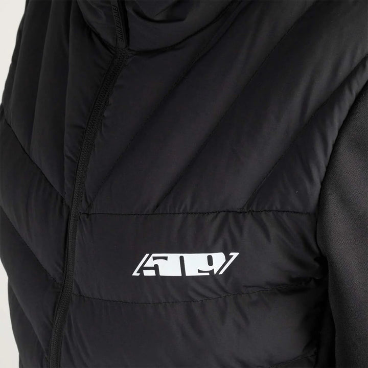 Black jacket with a brand logo on a light gray background